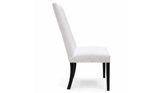 White chair with black legs on a white background