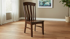 Wooden chair with slatted back on a white background