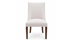 White upholstered chair with wooden legs on a white background