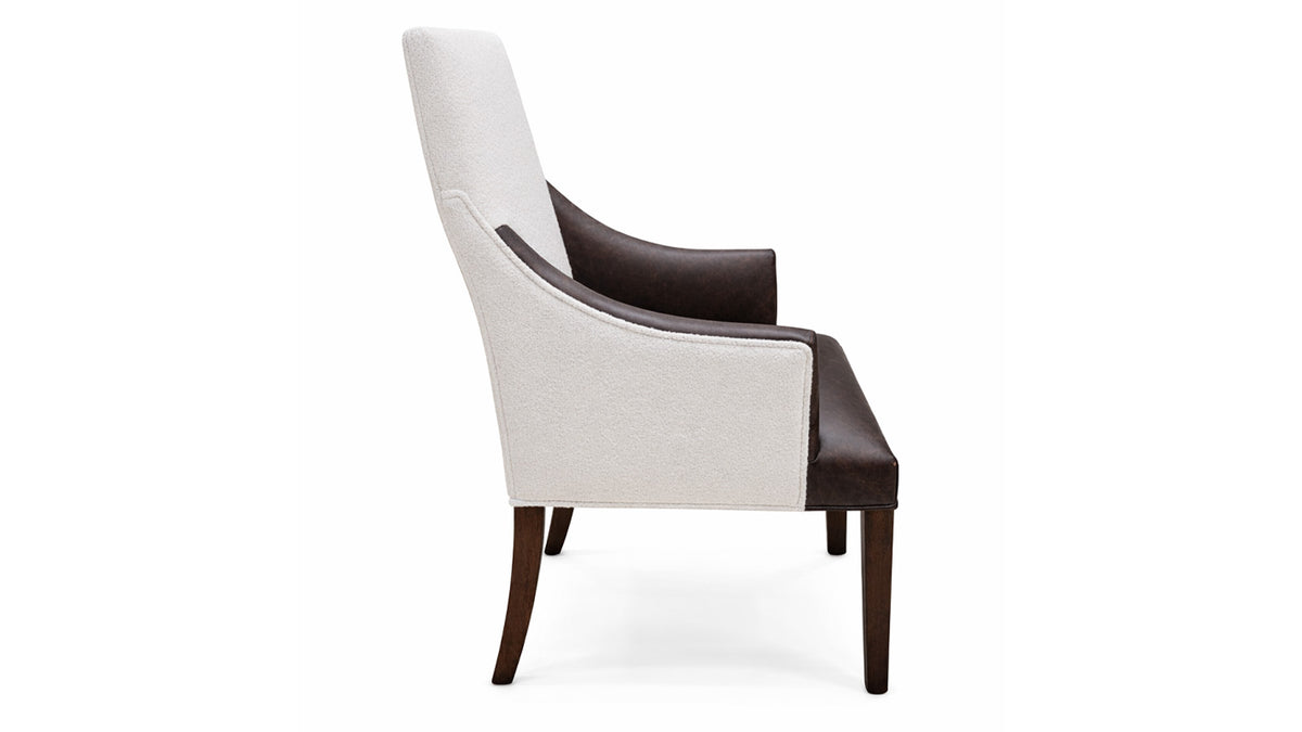 Chair with white cushioned backrest and brown armrests on a white background