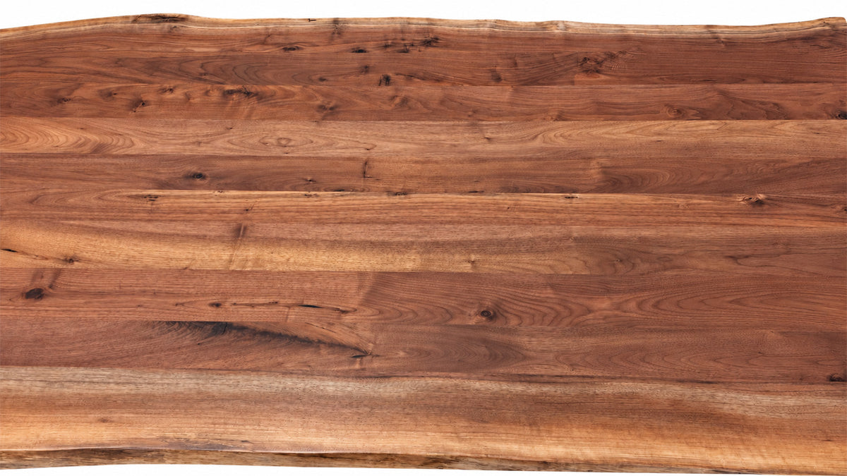 Mesa de comedor de madera maciza con bordes naturales y base metálica