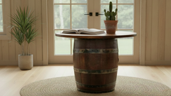 Wooden barrel table with a book and cactus in a home setting