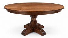 A round wooden dining table with a dark brown finish and a carved pedestal base, shown on a plain white background.