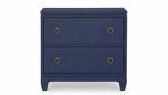 Navy blue dresser with gold handles on a white background