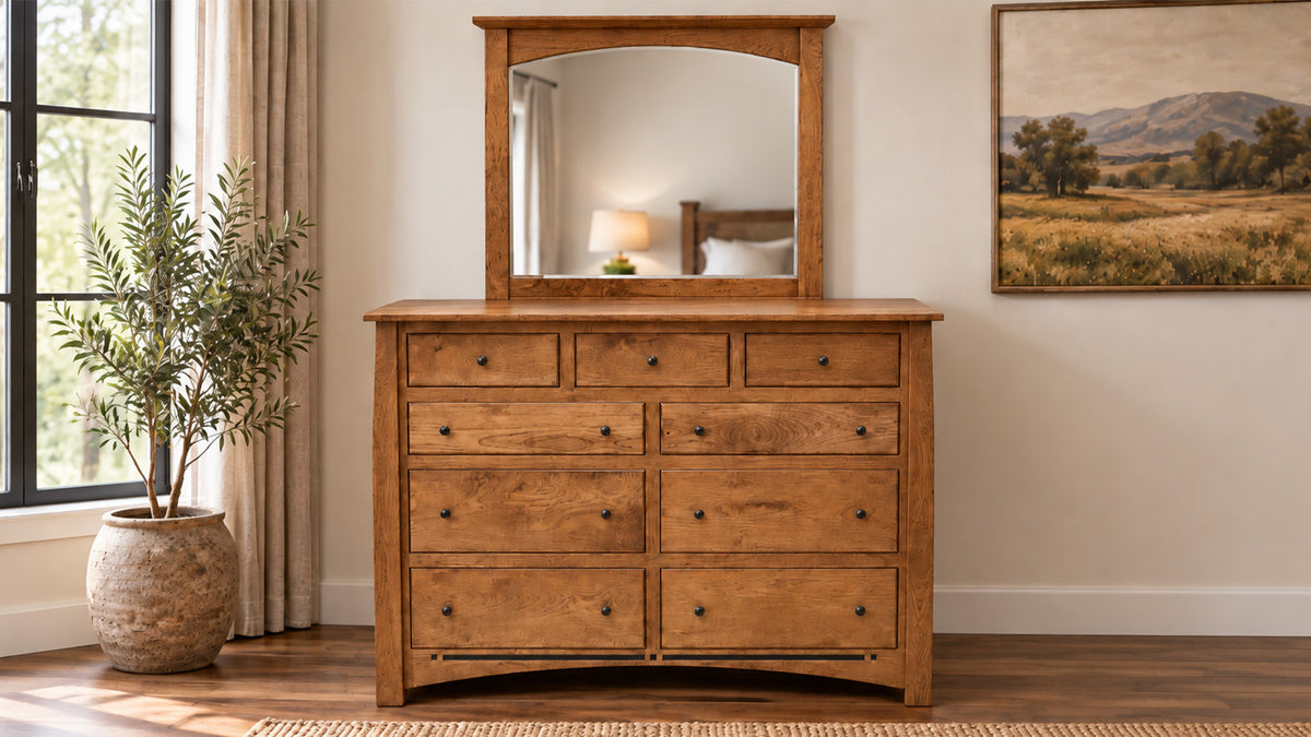 dresser and mirror in a room