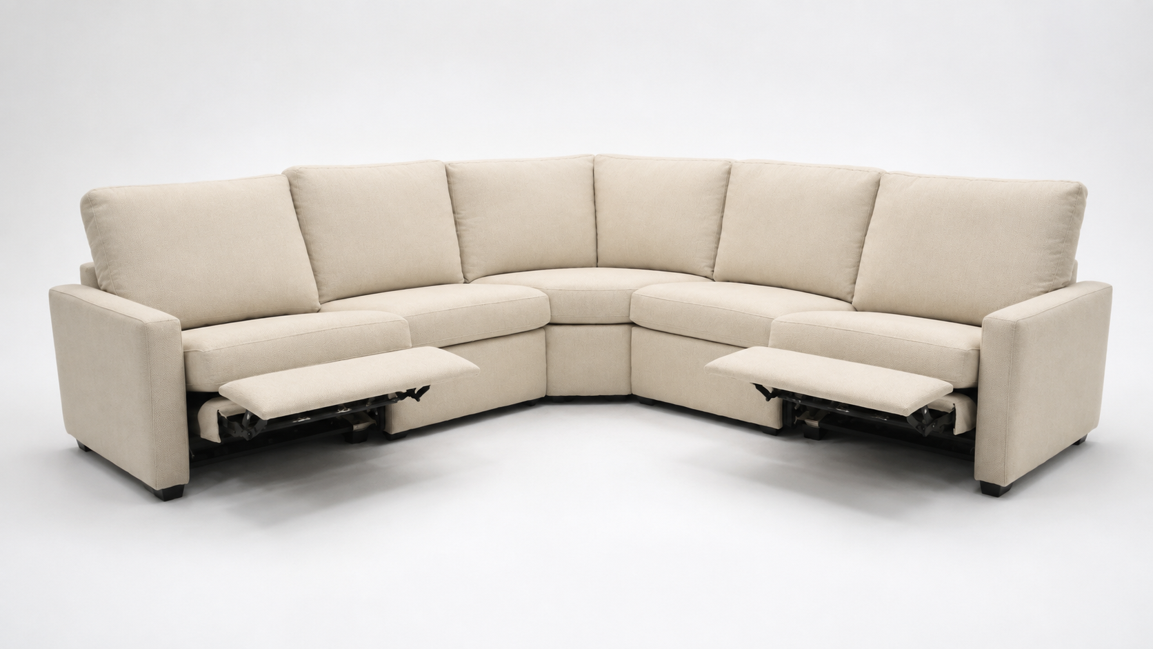 A curved upholstered reclining sectional sofa in a light beige fabric, shown with both outer armrests extended in a reclined position on a clean white studio background.