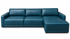 A modern sectional sofa with a right-facing chaise lounge, upholstered in a deep teal blue leather, shown against a plain white background.