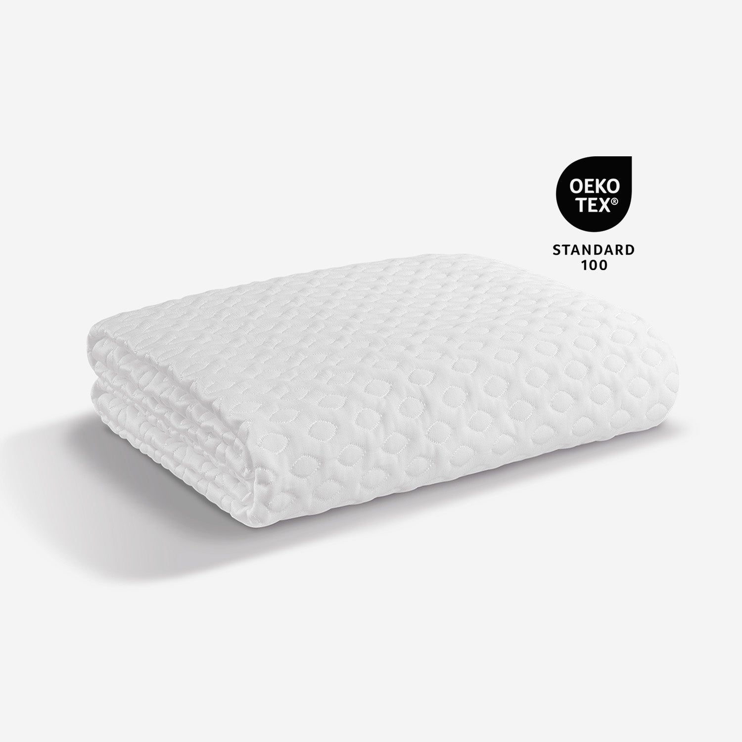 Folded white protector on a light gray background with OEKO-TEX Standard 100 logo.