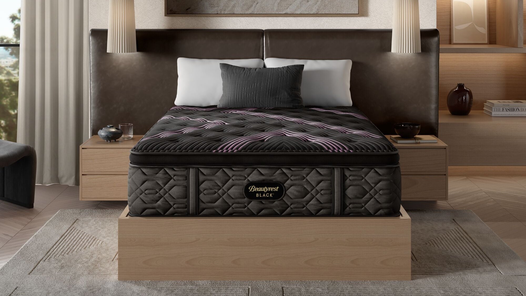 A queen size Beautyrest Black Series 2 Plush Pillowtop Mattress in a bedroom setting, featuring a plush top with a patterned design and a supportive base structure.