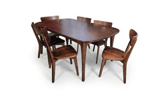 Wooden dining table with six chairs on a white background