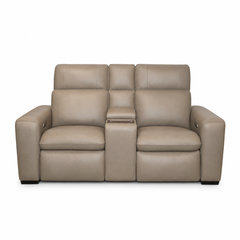 Beige leather reclining sofa on a white background