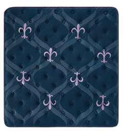 A square mattress or mattress topper shown from above on a plain white background. The surface is dark blue with a quilted tufted pattern, wavy geometric lines, and repeated pale lavender fleur-de-lis motifs.