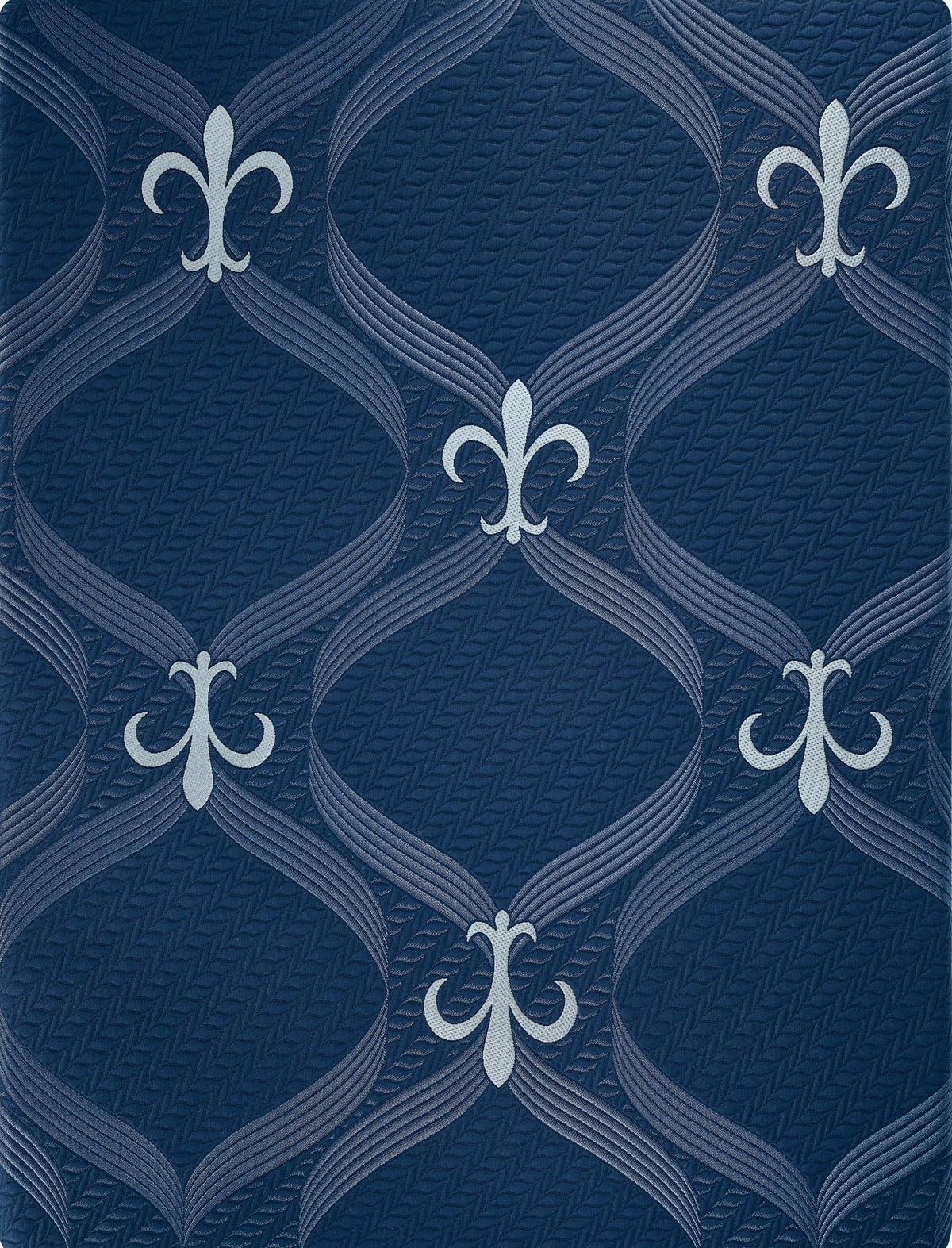 A square navy blue rug with a repeating pattern of white and light gray fleur-de-lis motifs over a textured geometric lattice design.