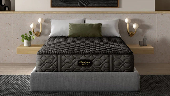 Mattress on a bed in a modern bedroom with decor elements.