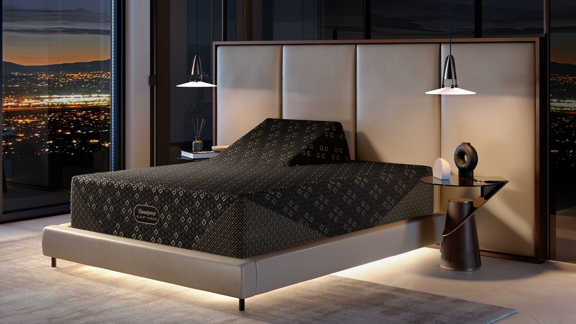 Modern bedroom with a bed and nightstands, featuring a cityscape view.