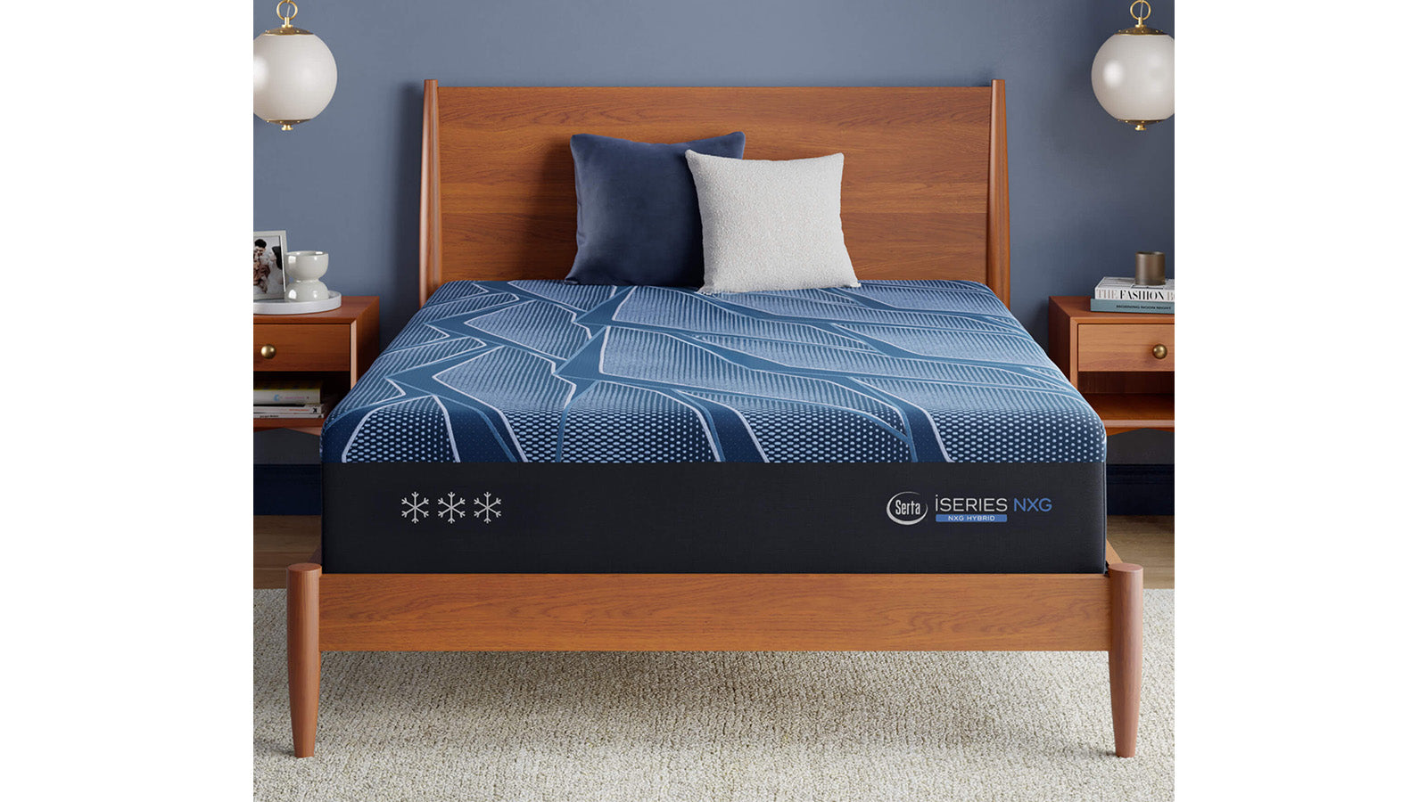 Bed with blue mattress topper and wooden headboard against a blue wall.