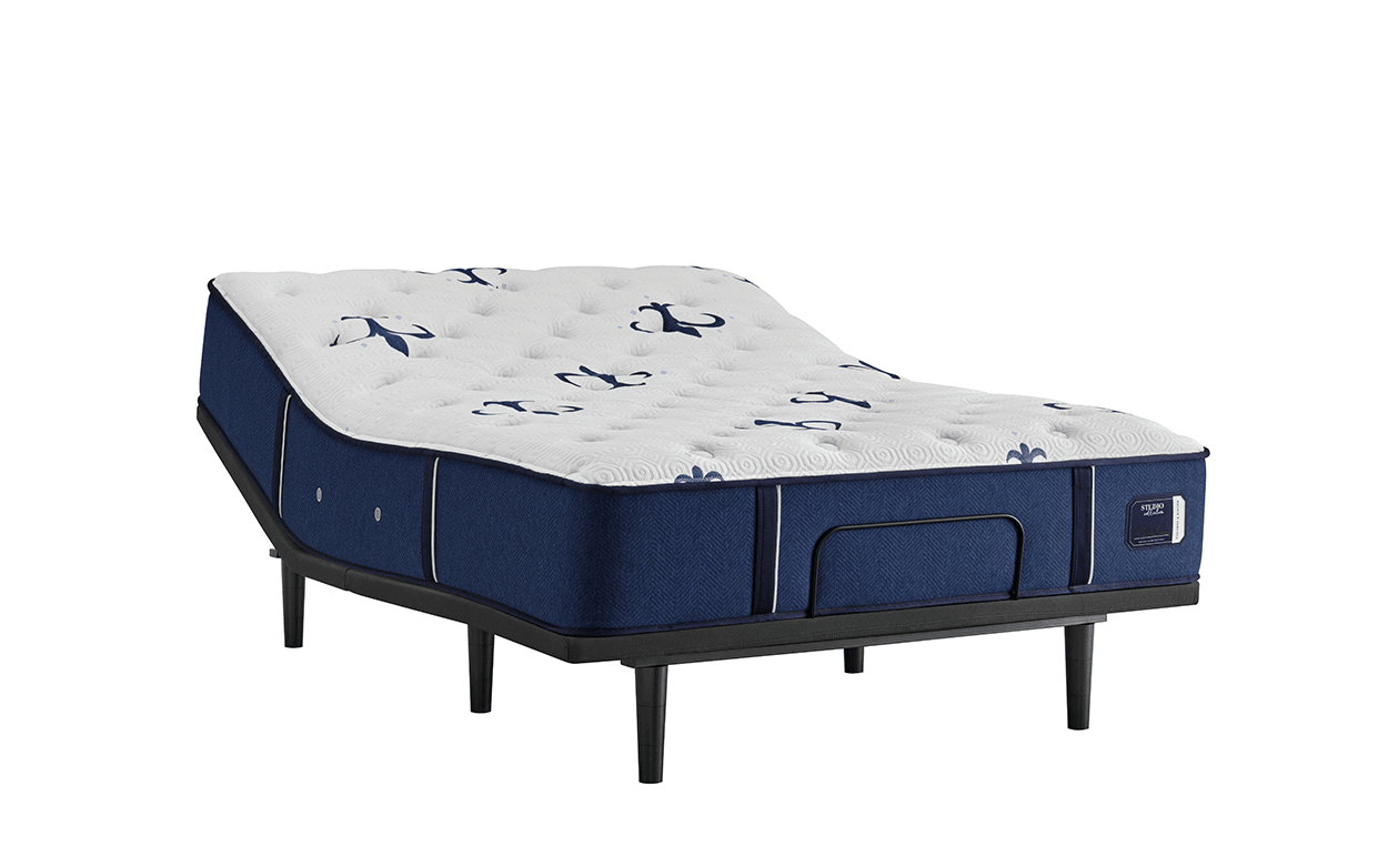 Blue and white mattress with anchor pattern on a white background