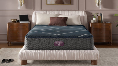Mattress on a bed in a bedroom setting with a neutral color scheme