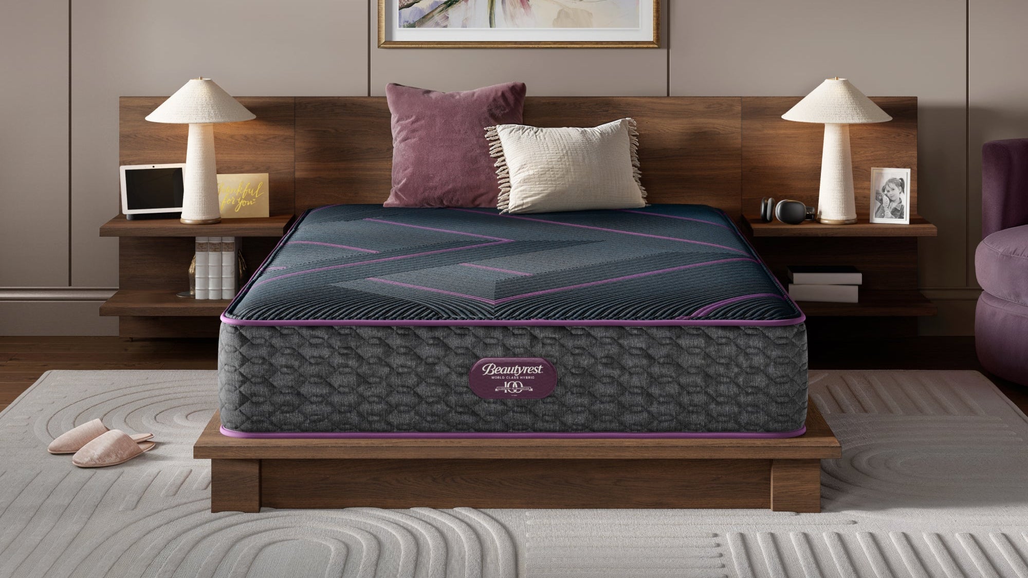 Mattress on a bed in a bedroom setting with decor elements.
