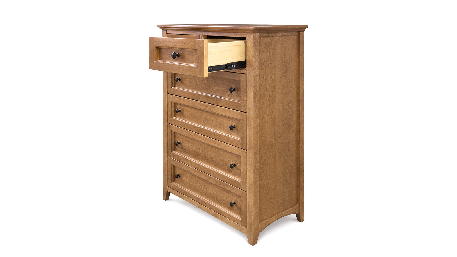 A five-drawer wooden chest of drawers in a warm medium brown finish, with the top drawer pulled open to show a light wood interior and black metal drawer pulls, set against a plain white background.
