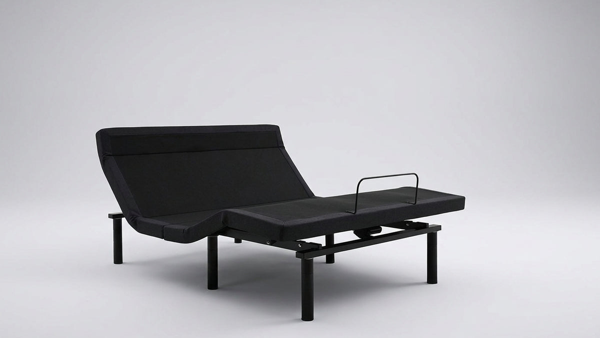 Black adjustable bed on a white background