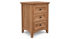 A three-drawer wooden nightstand with a warm medium-brown finish, featuring three drawers with inset panels and small round black knobs, set against a plain white background.
