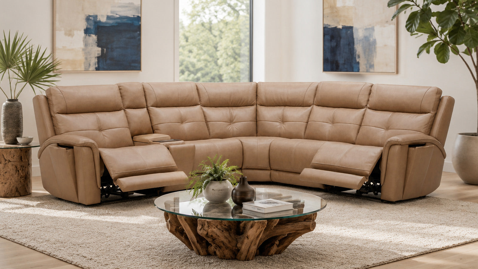 Beige sectional sofa in a living room with a coffee table and decorative elements.