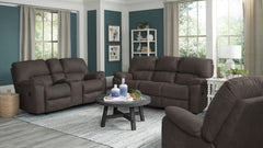 Living room with brown reclining sofas and a small round table.
