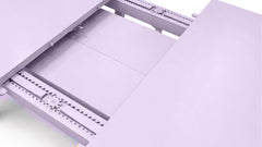 Close-up of a printer's paper tray with a white background